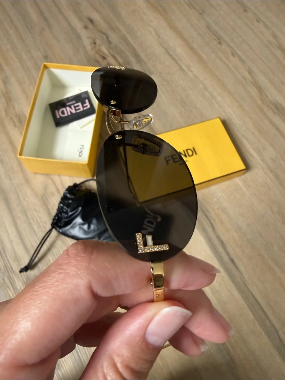 Fendi Slim Oval Sunglasses in Dark Brown and Gold